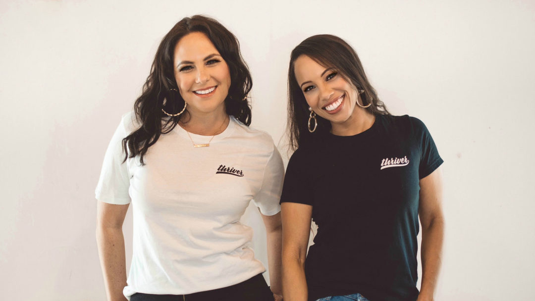Stephanie Seban and Amanda Anik wearing thriver t-shirts